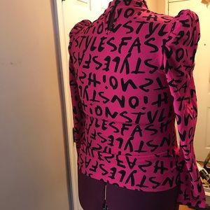 Funkadelic Shirt with ruffled shoulders.